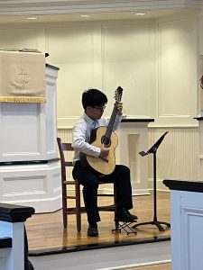 Terry Lin performs at the 2025 Florida Suzuki Association Senior Recital