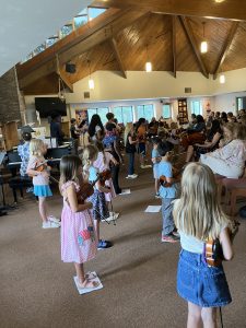 Nearly fifty students surrounded the audience at Grace Lutheran Church